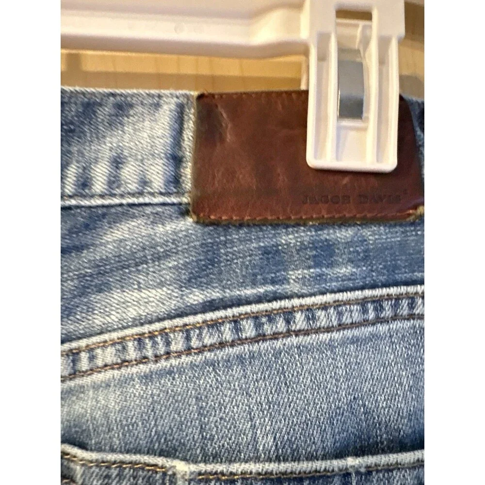 Jacob Davis medium-wash denim jeans featuring a distinct copper-toned 30x34
